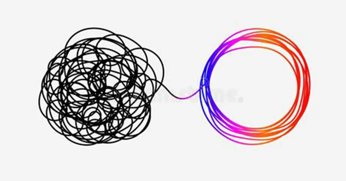 une pelote emmélée noire se débobinne en ordre et en couleur